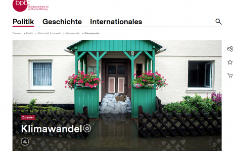 Screenshot Dossier: Klimawandel. Sandsäcke schützen eine Haustür vor Hochwasser.