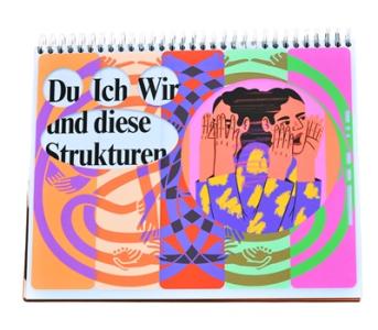 Spiralblock „Du Ich Wir und diese Strukturen": Buntes Cover mit abstrakter Illustration einer Person, die Hände vors Gesicht hält, in kräftigen Farben (Lila, Orange, Pink, Grün).